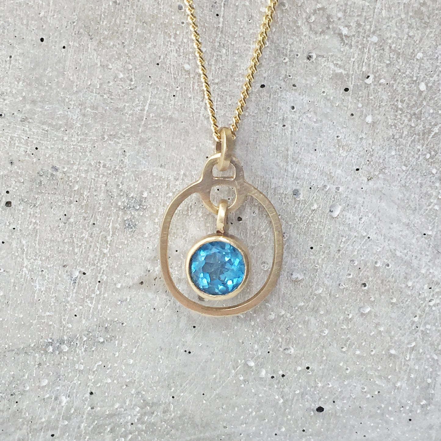 Blue Topaz Drop Pendant Gold