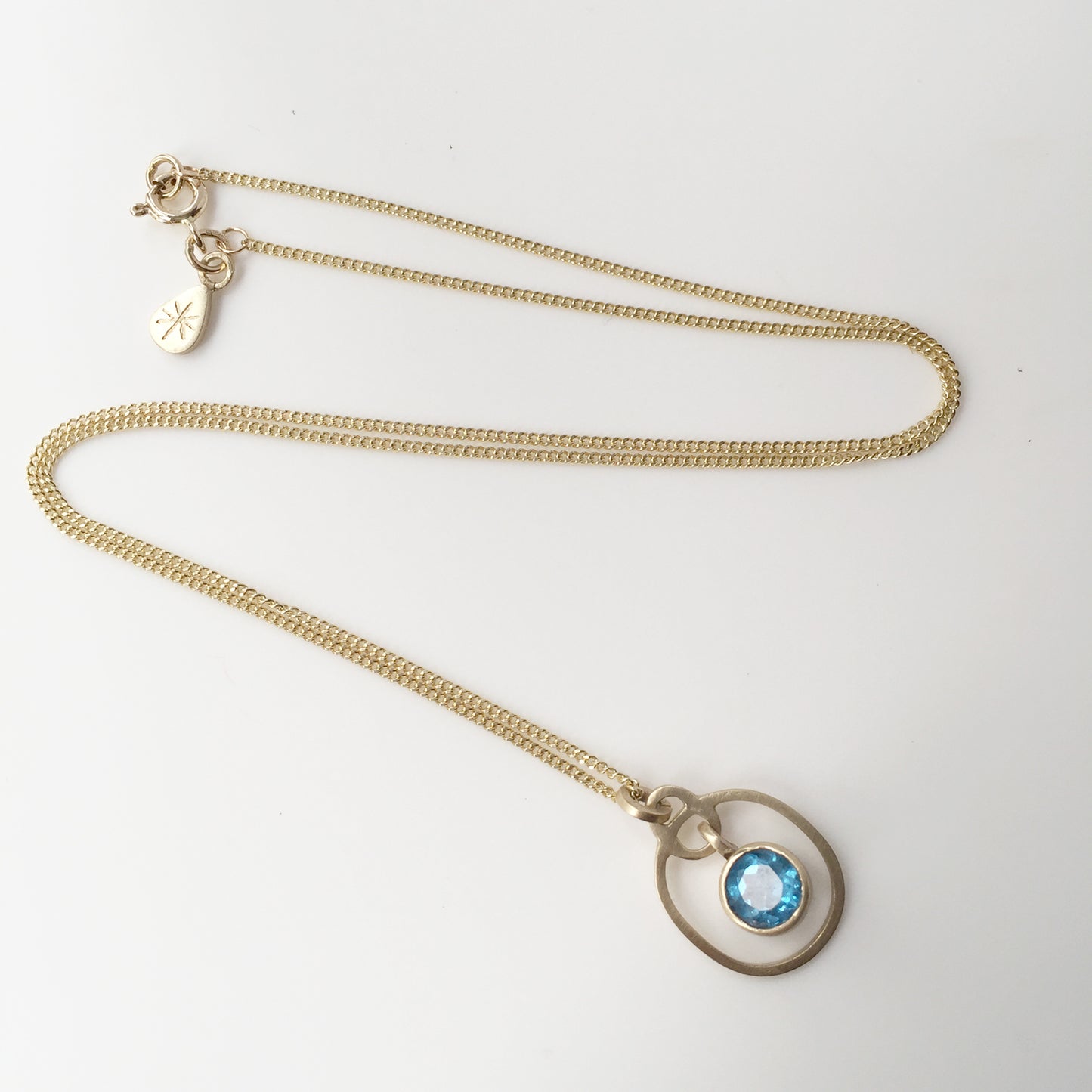 Blue Topaz Drop Pendant Gold
