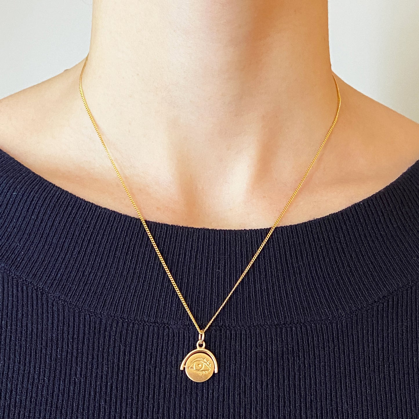Winking Eye Spinning Pendant in Gold