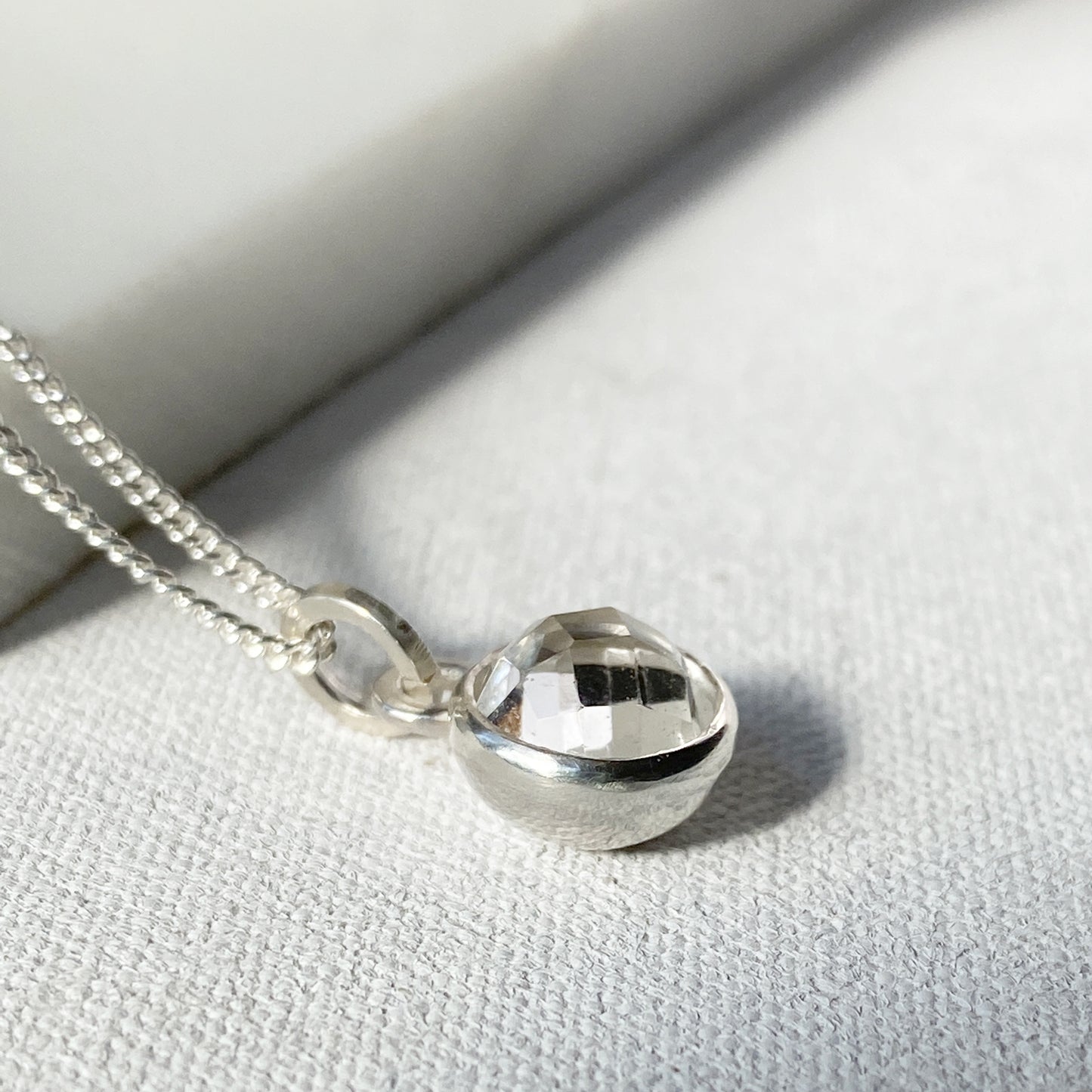 Birthstone Orb Rock Crystal Silver Pendant