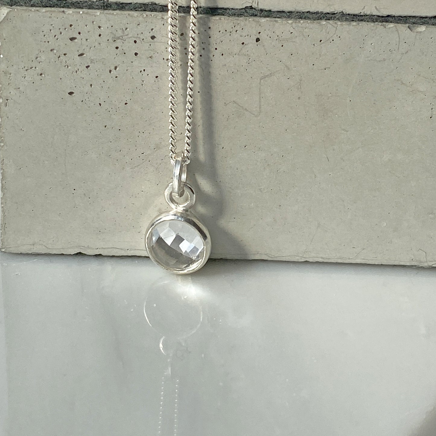 Birthstone Orb Rock Crystal Silver Pendant