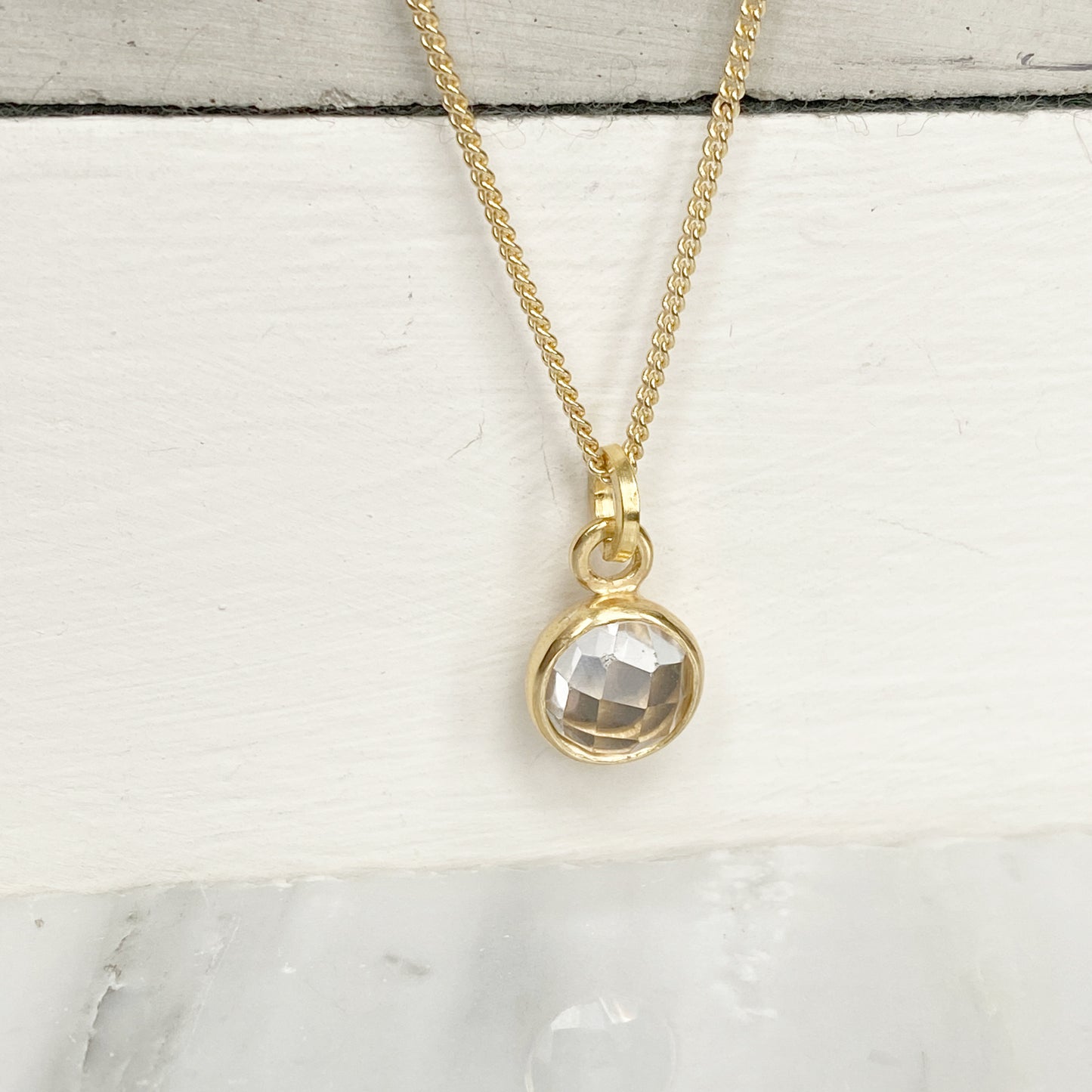 Birthstone Orb Rock Crystal Gold Pendant