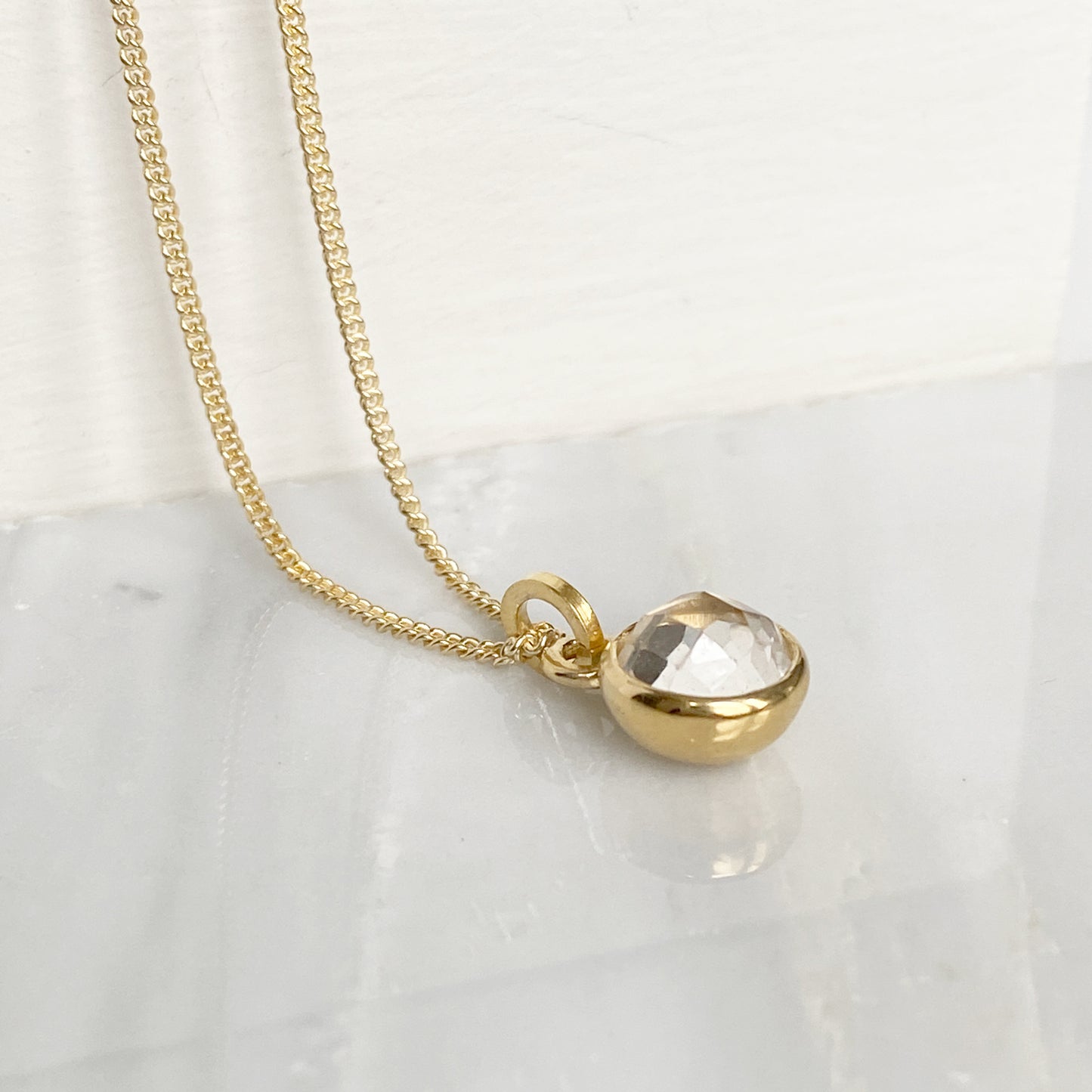 Birthstone Orb Rock Crystal Gold Pendant