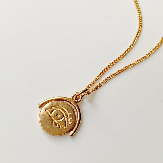 Winking Eye Spinning Pendant in Gold